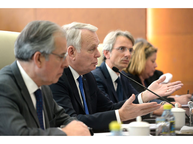 french foreign minister jean marc ayrault speaks with chinese foreign minister wang yi not pictured during their meeting at the ministry of foreign affairs in beijing china april 14 2017 photo reuters