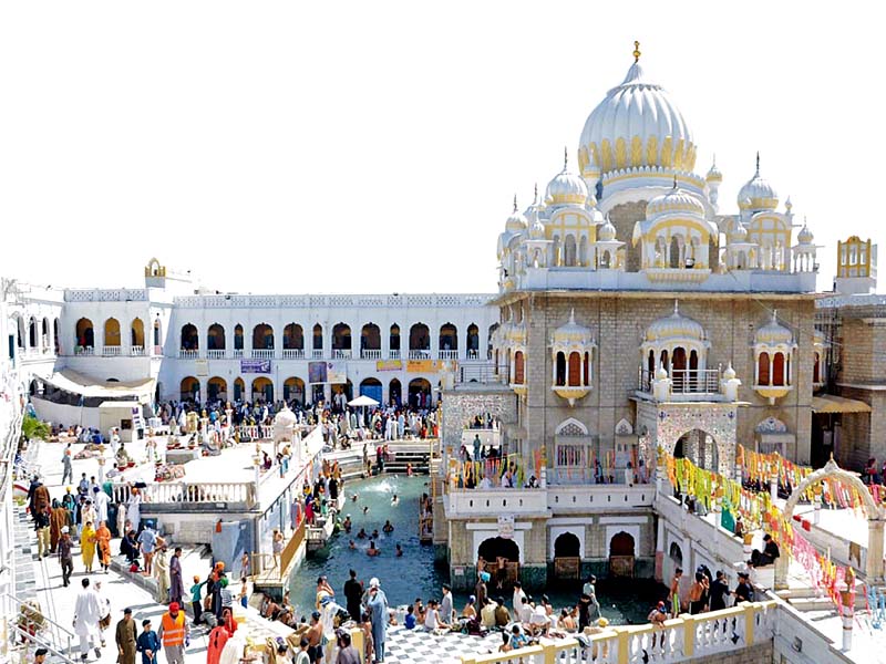 sikh pilgrims perform religious rites at gurdwara panja sahib at hassanabdal photo agencies