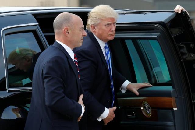 u s president donald trump r arrives to board air force one photo reuters