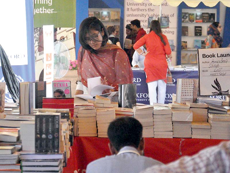 people browse through books during ilf photo online