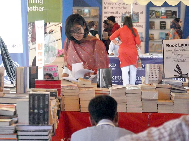 people browse through books during ilf photo online people browse through books during ilf photo online