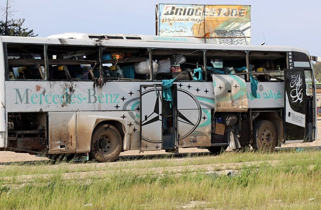a bomb blast hit a bus convoy waiting to cross into government held aleppo in syria on saturday killing dozens of people photo reuters a bomb blast hit a bus convoy waiting to cross into government held aleppo in syria on saturday killing dozens of people photo reuters