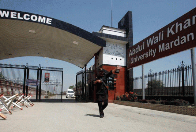 a policeman gestures as he stands guard at the entry of abdul wali khan university where mashal khan accused of blasphemy was killed by a mob in mardan april 14 2017 photo reuters a policeman gestures as he stands guard at the entry of abdul wali khan university where mashal khan accused of blasphemy was killed by a mob in mardan april 14 2017 photo reuters