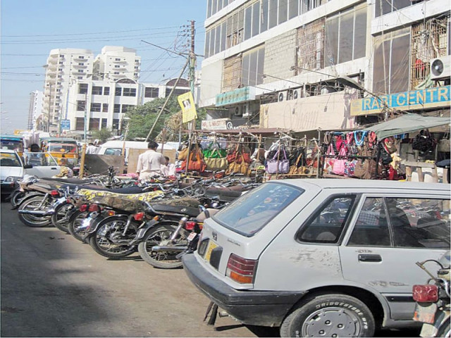 this road on the side on rabi centre on tariq road leads to the overcrowded khalid bin waleed road which was commercialised now car showrooms have not only blocked half the traffic arteries on both sides but have also barricaded the entrances to such side roads photo courtesy farhan anwar this road on the side on rabi centre on tariq road leads to the overcrowded khalid bin waleed road which was commercialised now car showrooms have not only blocked half the traffic arteries on both sides but have also barricaded the entrances to such side roads photo courtesy farhan anwar