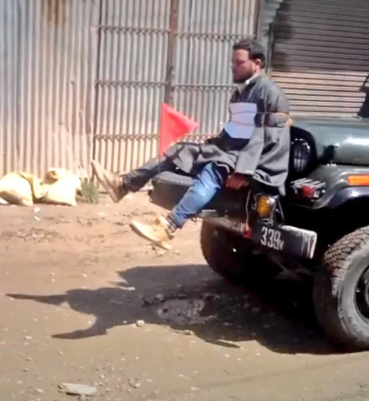 videograb shows a kashmiri youth being tied to an indian army jeep in held kashmir photo twitter videograb shows a kashmiri youth being tied to an indian army jeep in held kashmir photo twitter
