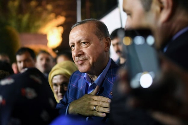 turkish president recep tayyip erdogan c flanked by his wife emine erdogan 2nd l leaves after delivering a speech at the conservative justice and development party akp headquarters in istanbul on april 16 2017 following the results of a nationwide referendum that will determine turkey 039 s future destiny photo afp turkish president recep tayyip erdogan c flanked by his wife emine erdogan 2nd l leaves after delivering a speech at the conservative justice and development party akp headquarters in istanbul on april 16 2017 following the results of a nationwide referendum that will determine turkey 039 s future destiny photo afp