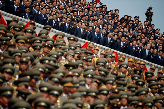 a soldier films north korean soldiers officers and high ranking officials attending a military parade marking the 105th birth anniversary of country s founding father kim il sung in pyongyang north korea april 15 2017 reuters damir sagolj tpx images of the day a soldier films north korean soldiers officers and high ranking officials attending a military parade marking the 105th birth anniversary of country s founding father kim il sung in pyongyang north korea april 15 2017 reuters damir sagolj tpx images of the day