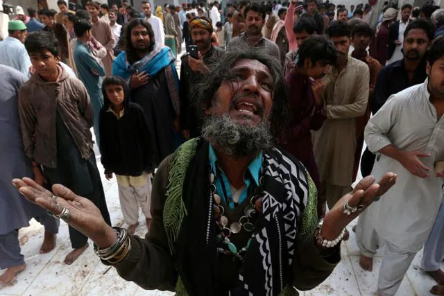 a man mourns the death of a relative who was killed in a suicide blast at the tomb of sufi saint syed usman marwandi also known as the lal shahbaz qalandar shrine in sehwan sindh on february 17 2017 photo reuters file a man mourns the death of a relative who was killed in a suicide blast at the tomb of sufi saint syed usman marwandi also known as the lal shahbaz qalandar shrine in sehwan sindh on february 17 2017 photo reuters file