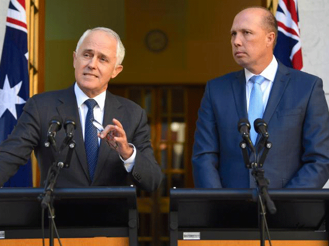 australia 039 s prime minister malcolm turnbull speaks as immigration minister peter dutton listens on during a media conference at parliament house in canberra australia april 18 2017 photo reuters