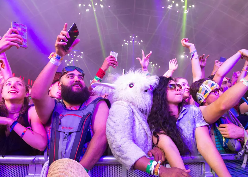 fans of dj khaled dance during his performance at the coachella valley music and arts festival on april 16 2017 in indio california photo afp fans of dj khaled dance during his performance at the coachella valley music and arts festival on april 16 2017 in indio california photo afp