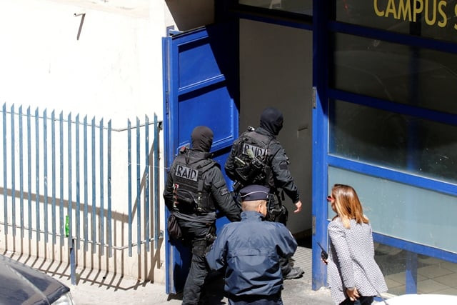 french police and members of special police units raid conduct an investigation after two frenchmen were arrested in marseille france photo reuters french police and members of special police units raid conduct an investigation after two frenchmen were arrested in marseille france photo reuters
