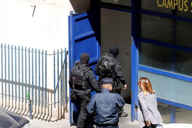 french police and members of special police units raid conduct an investigation after two frenchmen were arrested in marseille france photo reuters french police and members of special police units raid conduct an investigation after two frenchmen were arrested in marseille france photo reuters