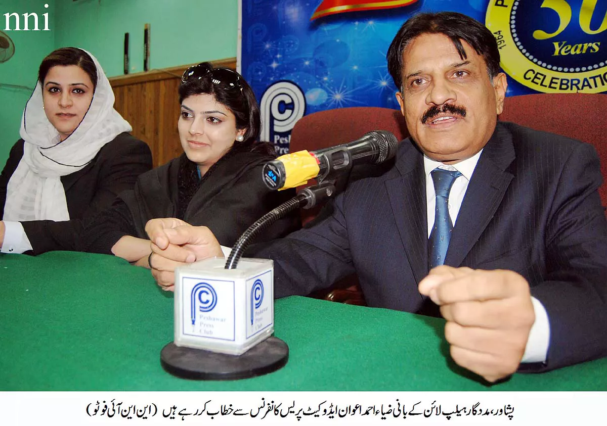 madadgaar national helpline 039 s zia ahmed awan speaking during a press conference in peshawar on wednesday photo nni
