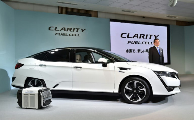 plug in hybrid models likely to follow photo afp plug in hybrid models likely to follow photo afp