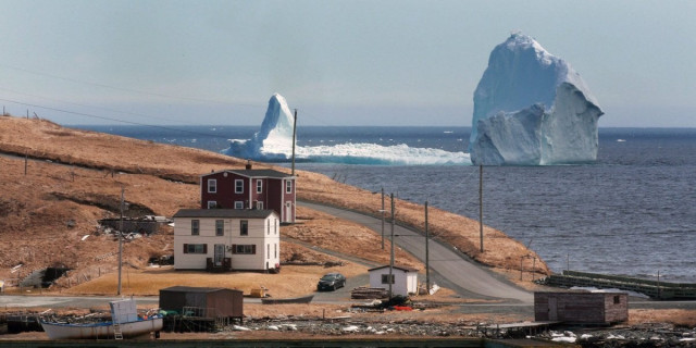 surrounded by shallow water the iceberg is estimated to be about 150 feet at its highest point photo twitter surrounded by shallow water the iceberg is estimated to be about 150 feet at its highest point photo twitter