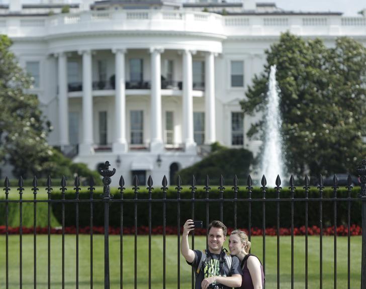 tourists take selfies by the original south lawn security fencing at the white house in washington photo reuters