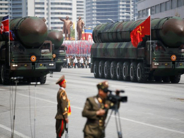 intercontinental ballistic missiles icbm are driven past the stand with north korean leader kim jong un and other high ranking officials during a military parade marking the 105th birth anniversary of country 039 s founding father kim il sung in pyongyang april 15 2017 photo reuters intercontinental ballistic missiles icbm are driven past the stand with north korean leader kim jong un and other high ranking officials during a military parade marking the 105th birth anniversary of country 039 s founding father kim il sung in pyongyang april 15 2017 photo reuters