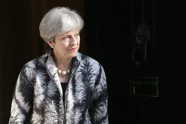 british prime minister theresa may walks out of 10 downing street in central london on april 20 2017 photo afp british prime minister theresa may walks out of 10 downing street in central london on april 20 2017 photo afp