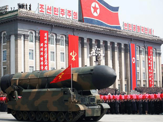 people cheer as a missile is driven past the stand with north korean leader kim jong un and other high ranking officials during a military parade marking the 105th birth anniversary of country 039 s founding father kim il sung in pyongyang april 15 2017 photo reuters