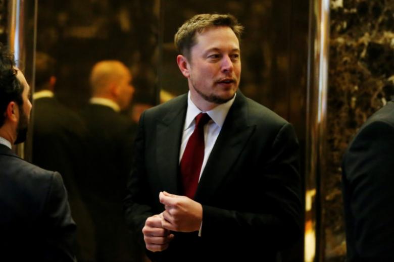 tesla chief executive elon musk enters the lobby of trump tower in manhattan new york us january 6 2017 photo reuters