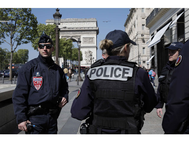 french crs police patrol the champs elysees avenue the day after a police personnel was killed and two others were wounded in a shooting incident in paris france april 21 2017 photo reuters