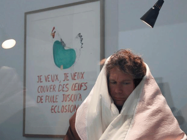 french artist abraham poincheval is seen in a vivarium on the first day of his performance in an attempt to incubate chicken eggs which takes from 21 to 26 days at the palais de tokyo museum in paris france march 29 2017 photo reuters french artist abraham poincheval is seen in a vivarium on the first day of his performance in an attempt to incubate chicken eggs which takes from 21 to 26 days at the palais de tokyo museum in paris france march 29 2017 photo reuters
