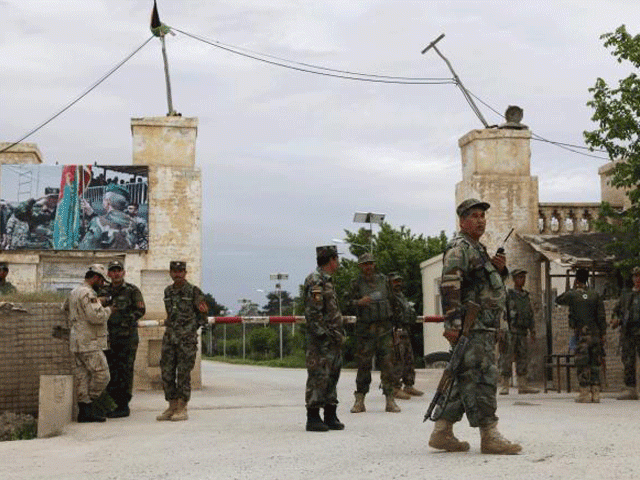 afghan national army ana troops keep watch near the site of an attack on an army headquarters in mazar i sharif northern afghanistan april 21 2017 photo reuters