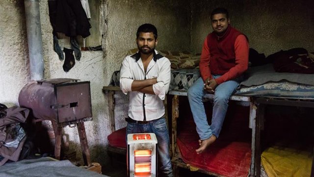 migrant workers gulfam and kaleem in their house on the edge of poullakida photo al jazeera