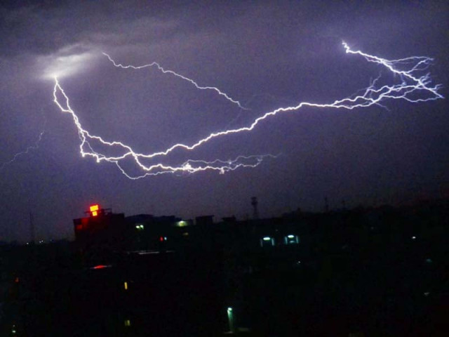 lightning cracks through the clouds over lahore on saturday night photo online