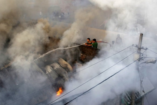 baldia factory fire victims say no other organisation can represent them when they have their own body photo reuters baldia factory fire victims say no other organisation can represent them when they have their own body photo reuters