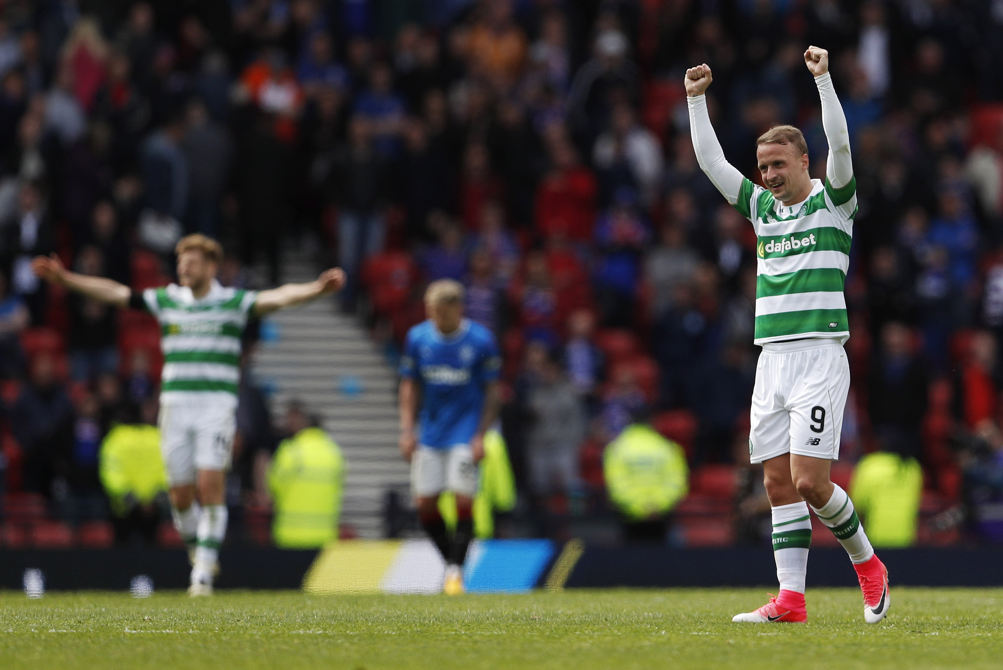 celtic 039 s leigh griffiths and team mates celebrate after the match against rangers on april 23 2017 photo reuters