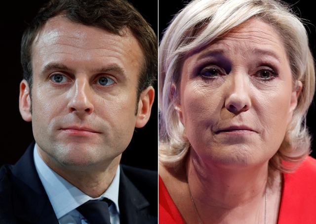 a combination picture shows portraits of emmanuel macron and marine le pen photo reuters