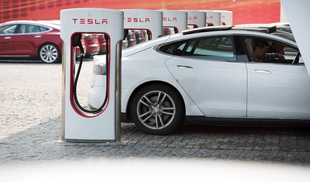 musk expects the model 3 rollout to help tesla deliver five times its current annual sales volume photo afp musk expects the model 3 rollout to help tesla deliver five times its current annual sales volume photo afp
