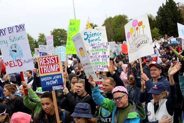 protestors hold signs during the march for science in seattle washington us april 22 2017 photo reuters protestors hold signs during the march for science in seattle washington us april 22 2017 photo reuters