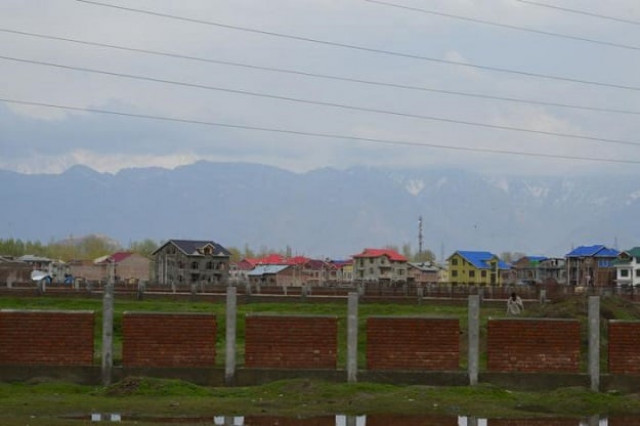 portion of a residential colony in a srinagar suburb built on paddy and wetland april 9 2017 photo reuters portion of a residential colony in a srinagar suburb built on paddy and wetland april 9 2017 photo reuters