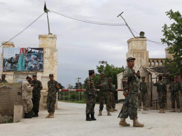 afghan national army ana troops keep watch near the site of an attack on an army headquarters in mazar i sharif northern afghanistan april 21 2017 photo reuters