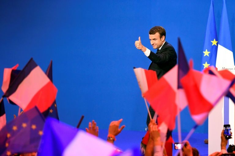 emmanuel macron topped the polls in the first round of the french presidential election he will face far right candidate marine le pen in the may 7 run off photo afp