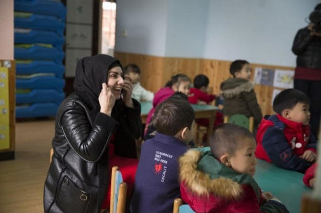 manar abdulhussein l 38 an iraqi migrant laughs in a kindergarten her son attends in yiwu zhejiang province china 11 january 2017 photo reuters manar abdulhussein l 38 an iraqi migrant laughs in a kindergarten her son attends in yiwu zhejiang province china 11 january 2017 photo reuters