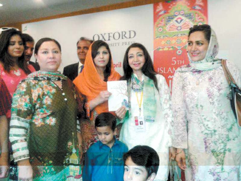 poet farzana naz and her family standing among the dignitaries after the closing of nbf photo express