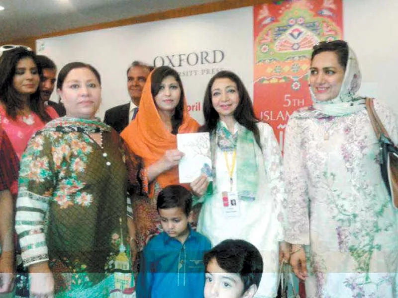 poet farzana naz and her family standing among the dignitaries after the closing of nbf photo express poet farzana naz and her family standing among the dignitaries after the closing of nbf photo express