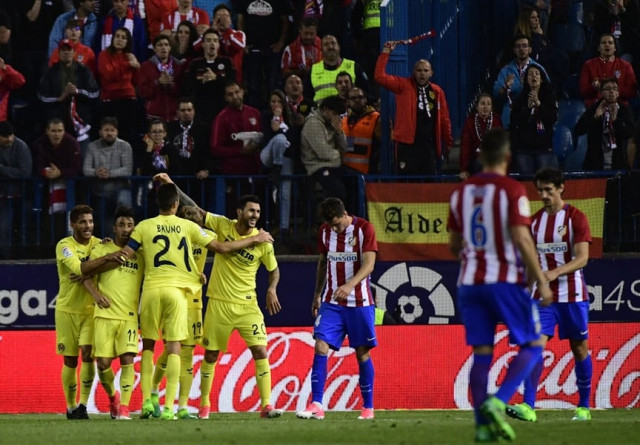 villarreal 039 s players celebrate after villarreal 039 s italian midfielder roberto soriano scored during the spanish league football match club atletico de madrid vs villarreal cf at the vicente calderon stadium in madrid on april 25 2017 photo afp villarreal 039 s players celebrate after villarreal 039 s italian midfielder roberto soriano scored during the spanish league football match club atletico de madrid vs villarreal cf at the vicente calderon stadium in madrid on april 25 2017 photo afp