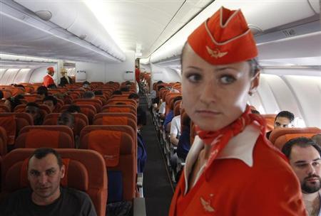 russian airline officials say passengers don t want to see overweight flight attendants