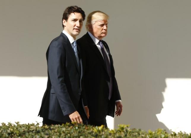 canadian prime minister justin trudeau l walks down the west wing colonnade with u s president donald trump at the white house in washington photo reuters
