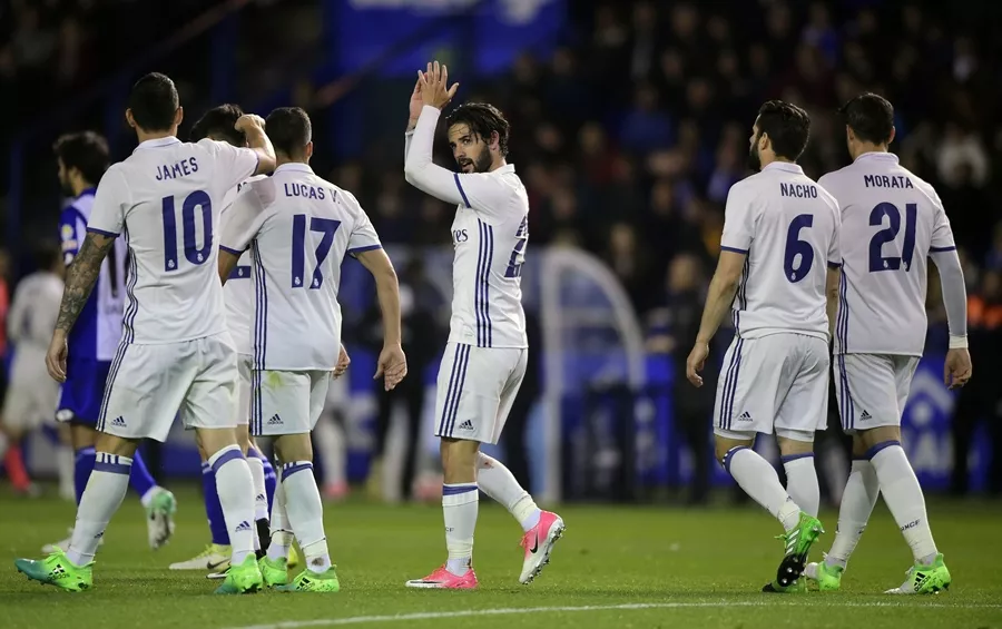 real madrid 039 s midfielder isco c celebrates with teammates after scoring a goal during the spanish league football match rc deportivo vs real madrid cf at the municipal de riazor stadium in la coruna on april 26 2017 photo afp real madrid 039 s midfielder isco c celebrates with teammates after scoring a goal during the spanish league football match rc deportivo vs real madrid cf at the municipal de riazor stadium in la coruna on april 26 2017 photo afp