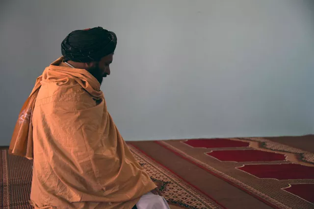 in this photograph taken on march 22 2017 former afghan taliban commander maulvi abdul rauf 37 offers prayers inside a mosque in the panjwayi district of kandahar province photo afp in this photograph taken on march 22 2017 former afghan taliban commander maulvi abdul rauf 37 offers prayers inside a mosque in the panjwayi district of kandahar province photo afp