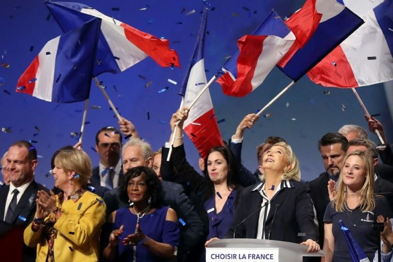 french far right presidential candidate marine le pen applauded by supporters at the end of a campaign meeting in nice photo afp