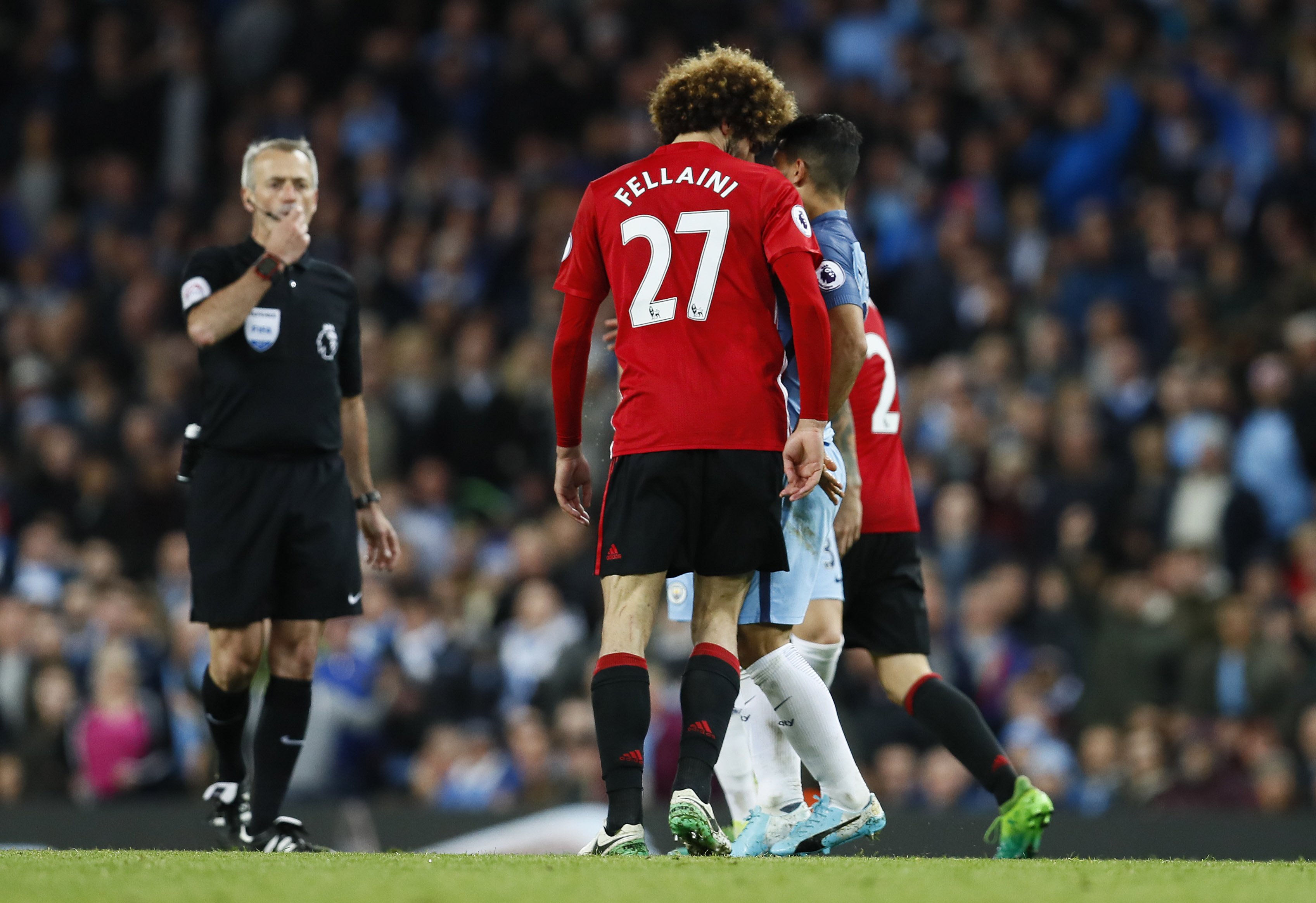 typical booked for tripping aguero in the 84th minute fellaini fouled him again seconds later and then blatantly butted the argentinian leaving referee no option but to send the belgian off photo reuters