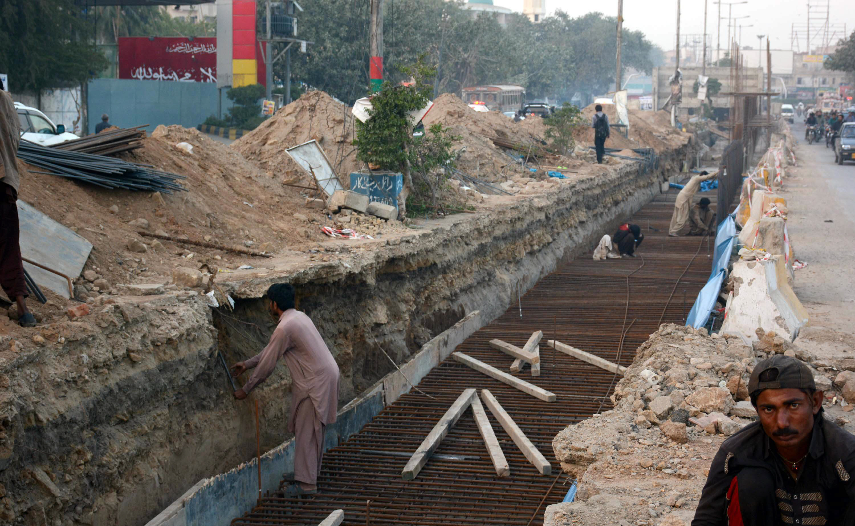 development work for green line bus rapid transit project being done on ma jinnah road in karachi photo file