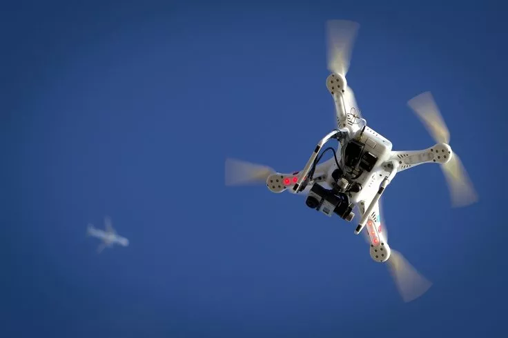 two white orb shaped drones were spotted flying below the aircraft photo reuters two white orb shaped drones were spotted flying below the aircraft photo reuters
