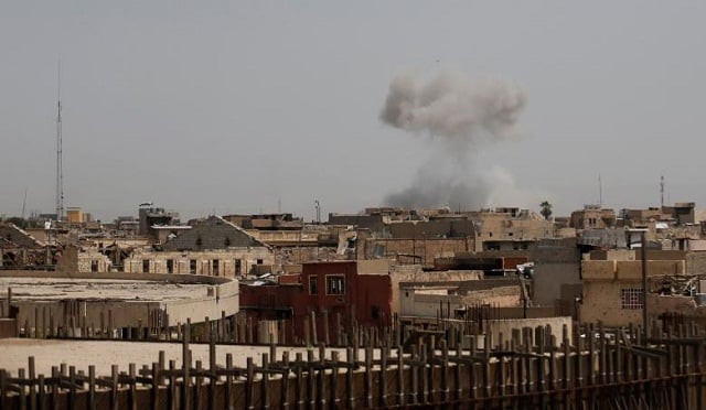 smoke rises as iraqi forces fight islamic state militants in western mosul iraq on april 29 photo reuters